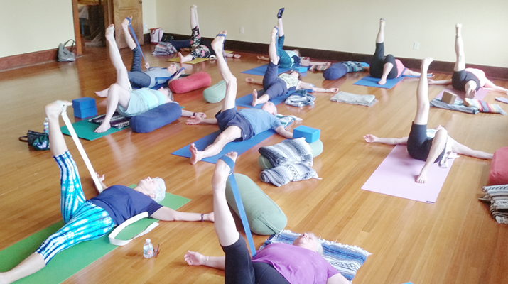 Yoga students at Beyond Yoga in Brockport. Many of them are over 55 years of age. They say practicing yoga improves their health and overall happiness. Photo by Christine Green
