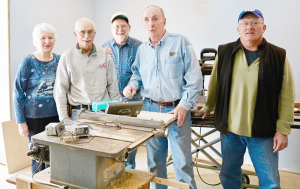 Dressed for work: Laurel House volunteers, from left, Pat Albrecht, Bob Hegeman, Dave Albrecht, Tom McUmber and Gene Palmer.