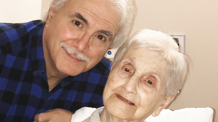 George Pecoraro, 72, and his mother, Mary, during her celebration of her 105th year.