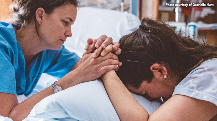 Heather Lane, left, a certified midwife with Strong Midwifery, working with mom Katelyn Sollame during her delivery at Highland Hospital. Photo courtesy of Gabriella Hunt.