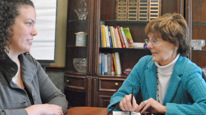 Alana Russell, left, director of Lifespan’s ombudsman program, regularly meets with volunteers like Laura Humphreys. Volunteers serve as patient advocates for residents in long-term care facilities. 