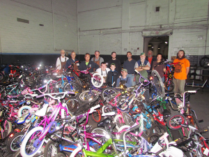 Part of a group of volunteers who dedicate 18,000 hours repairing and distributing 2,000 bicycles to dozens of community organizations, needy families and individuals with disabilities in Rochester every year. In addition, volunteers perform nearly 3,000 repairs for individuals, many of whom depend on a bicycle as their main source of transportation. Photo provided.