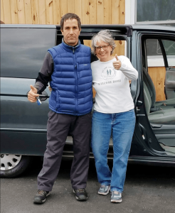 No One Left Behind – Rochester Chapter President Ellen Smith is pictured with a refugee who recently received a car as part of Operation Wheels for Work. The refugee received a special immigration visa for helping American troops in Iraq and Afghanistan.