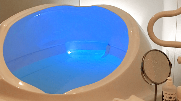 Tranquility Pool does not have an enclosure. The room itself provides darkness, quietness and warmth. It features a pod-like shape, and is designed for solo floaters. Photo provided.