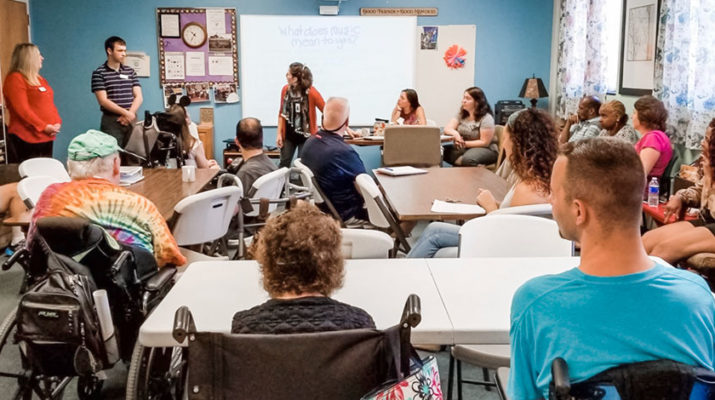 Leading a group music therapy session at The Hickok Center for Brain Injury.