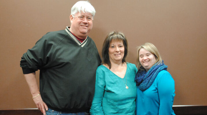 Kayla, far right, with her parents, Mark and Patti McKeon.