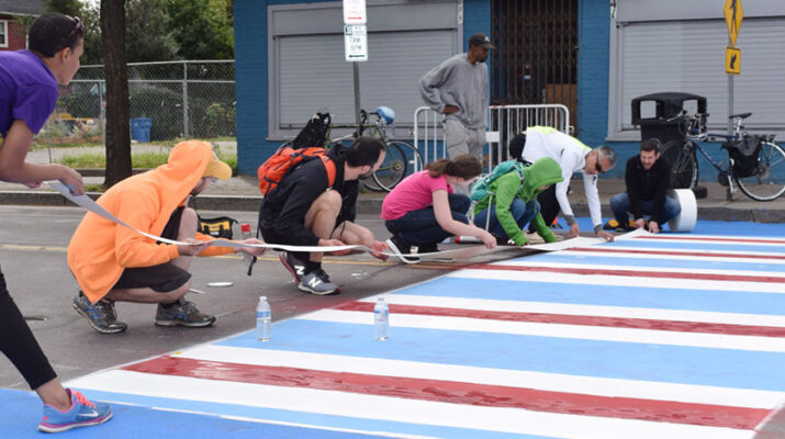 Common Ground Health has advocated for traffic safety, including colorful cross walks, higher visibility crosswalks around schools and playful sidewalk projects. Photos provided by Common Ground Health